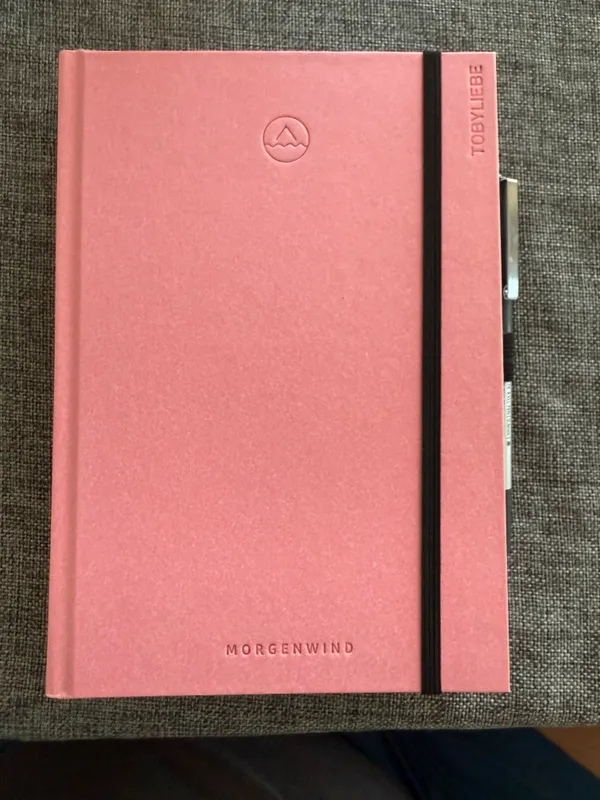 Pink diary with engraved "Tobyliebe" (Toby-love)
